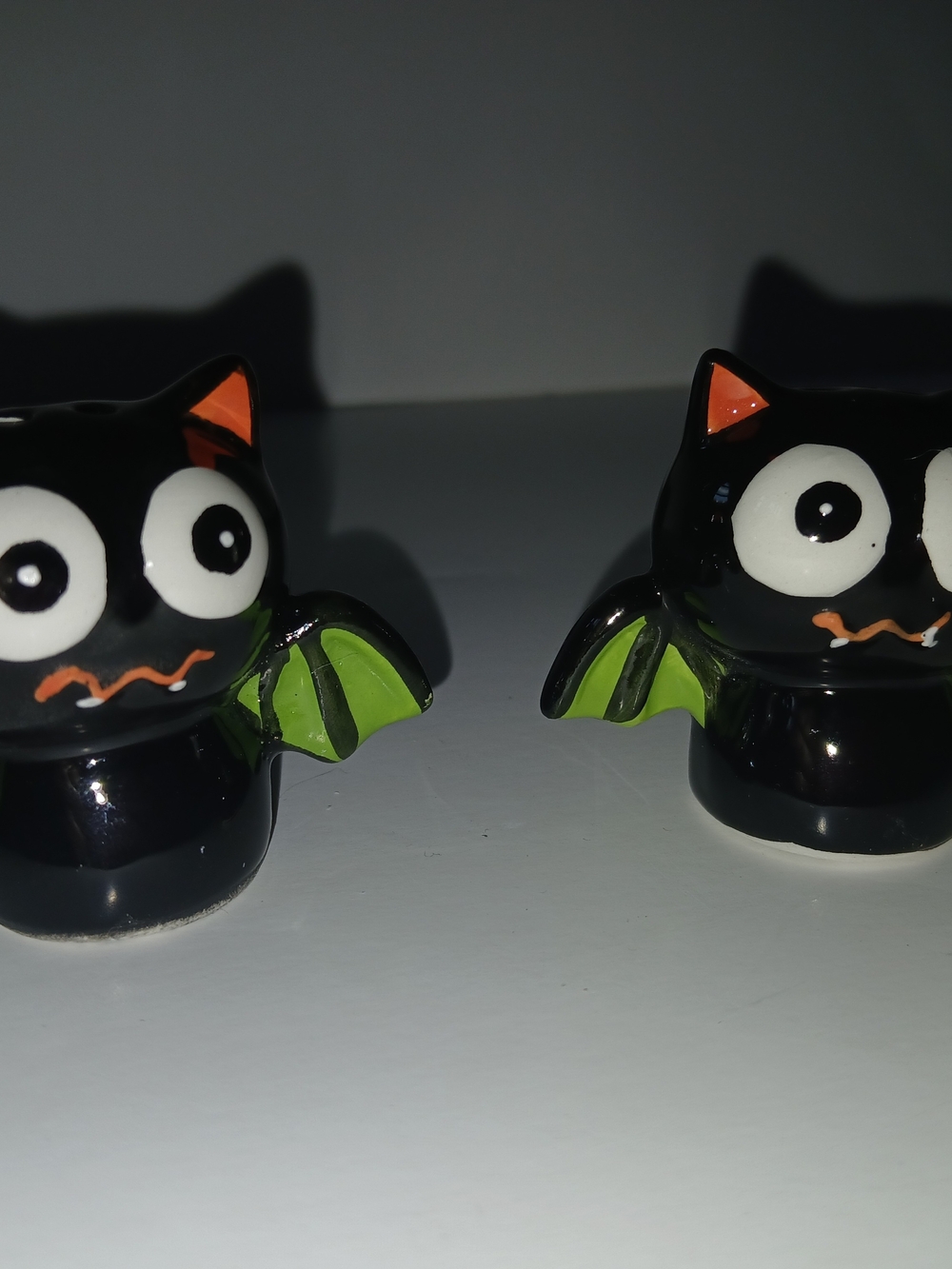 Black Ceramic Cat Bat Figurine Pair with Green Wings Salt & Pepper Shakers